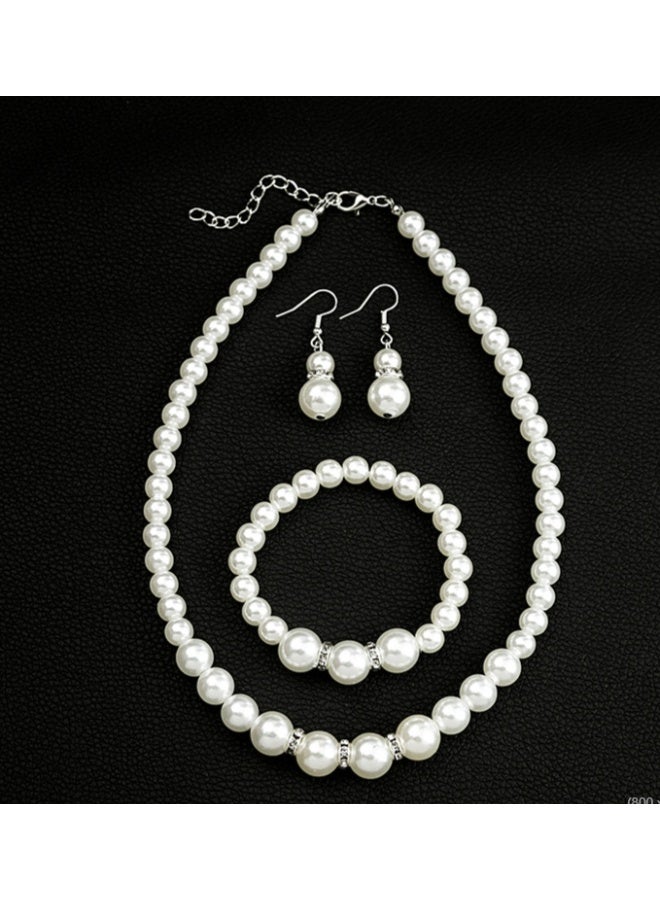 لاتين طقم مجوهرات أنيق مكون من عقد وأقراط وسوار من اللؤلؤ الصناعي، مثالي لحفلات الزفاف والخطوبة والمناسبات الرسمية للنساء. - Image 3